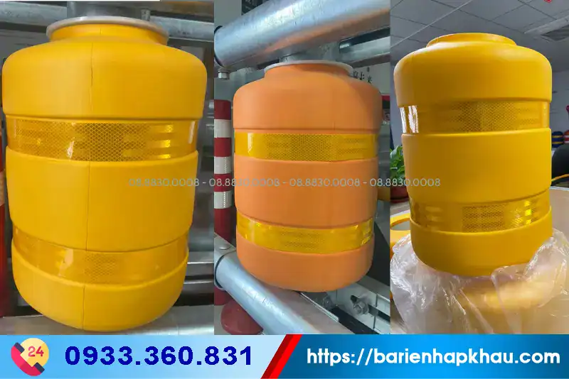 Hộ lan xoay chống lật xe màu vàng có decal phản quang, an toàn cho xe tải và xe container.